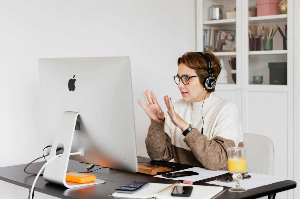 woman at computer on video cal