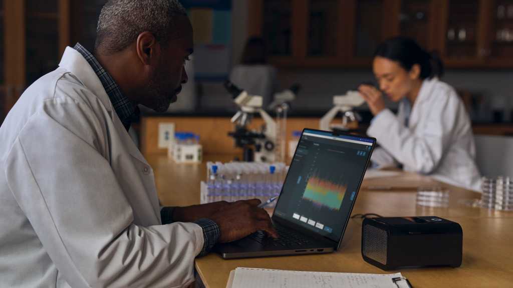 Scientist using a MacBook Pro